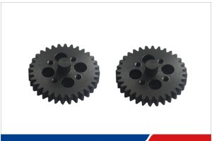 Main screw rotation drives PEEK gear